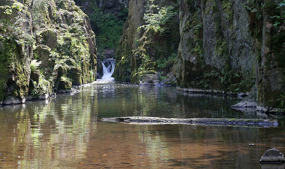 Photo: Skryjské jezírko and waterfall, Křivoklátsko Protected Landscape Area, Czech Republic by Naďa Čel, licensed under the Creative Commons Attribution-ShareAlike 4.0 International (CC BY-SA 4.0) license.